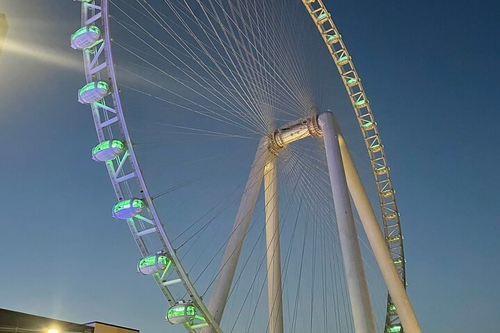 Experience the magic of Dubai from new heights! Ascend the iconic Ferris wheel and soak in breathtaking views creating unforgettable memories on your travel adventure.